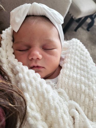 Elle Pruitt at one month old, sleeping peacefully