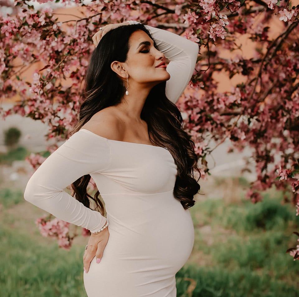 Priscilla Pruitt maternity portrait in white gown