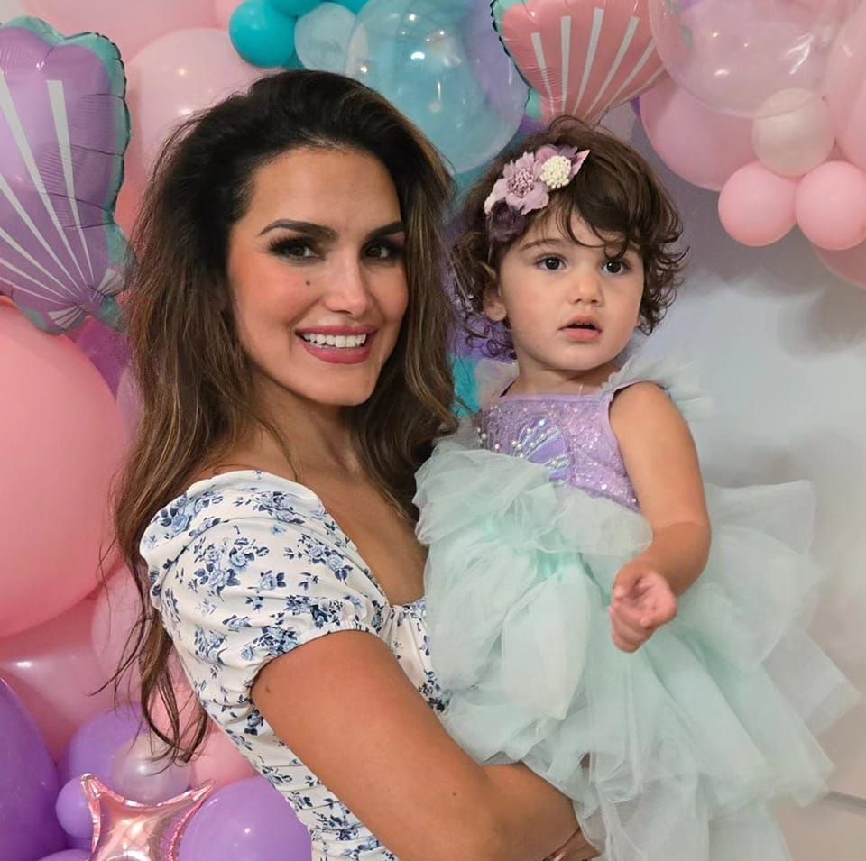 Priscilla with her young daughter